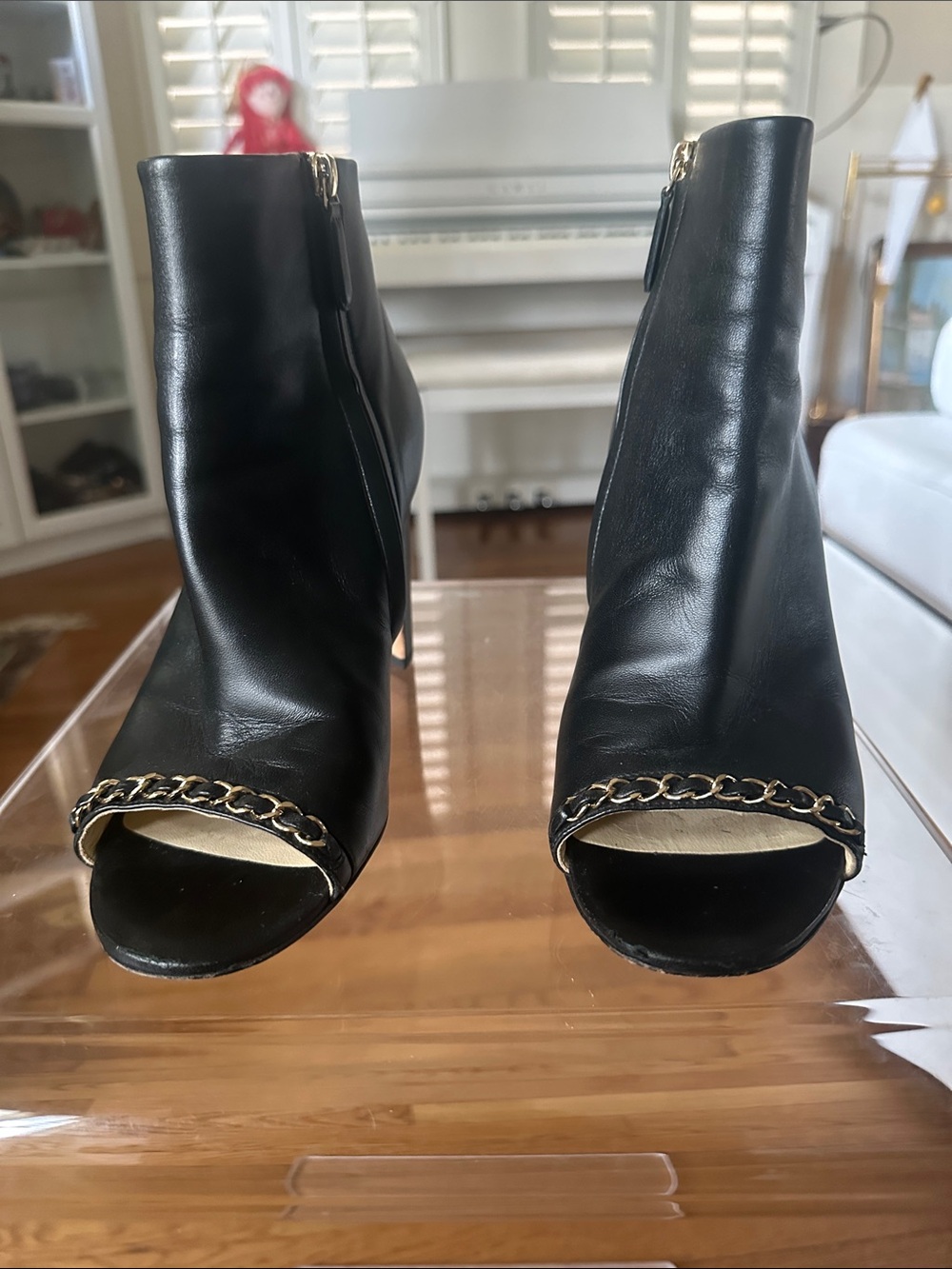 CHANEL Black Leather Peep-Toe Ankle Boots with Gold Chain Trim